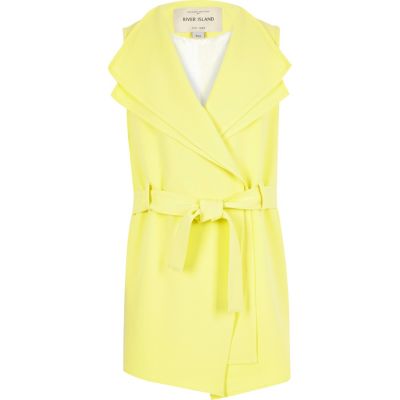 Girls light yellow sleeveless jacket
